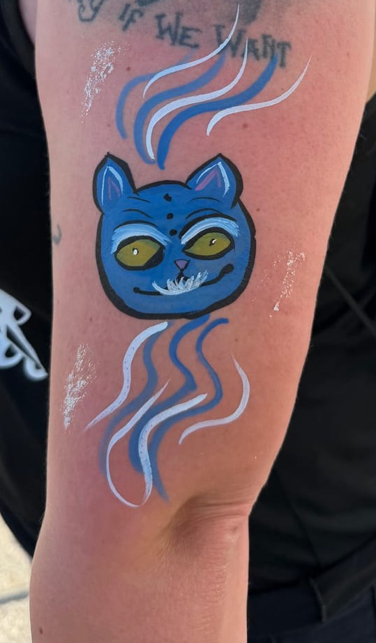 K-pop Demon Hunters themed arm painting at a Texas party